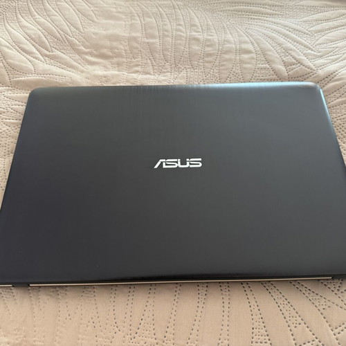 Asus VivoBook laptop with new charger, 15-inch, Intel Celeron, 4GB RAM
