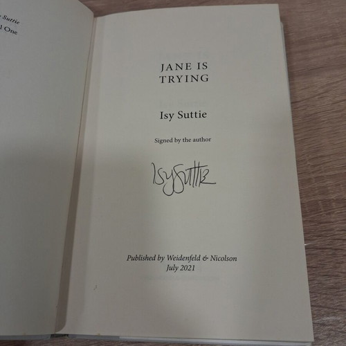 Jane Is Trying hardcover book signed by author used