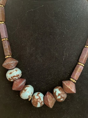 Necklace with turquoise and brown beads, leather base