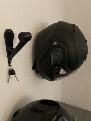 Minimalist wall-mounted helmet holder made to order
