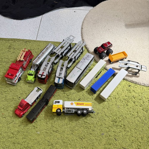 Large collection of toy trucks with accessories