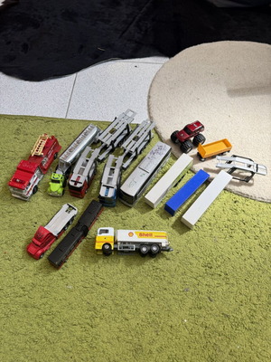 Large collection of toy trucks with accessories