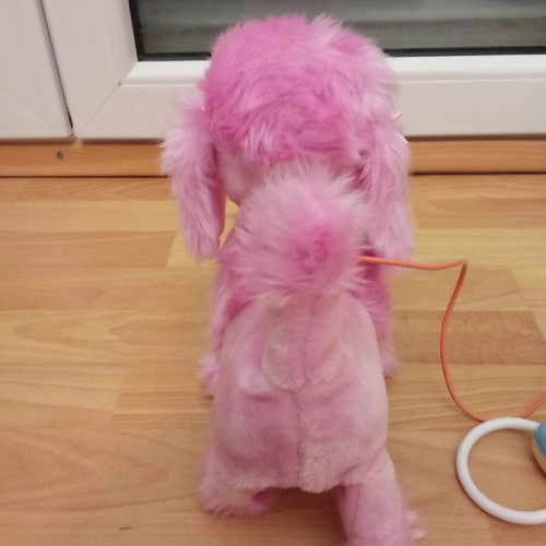 Toy dog with remote control like new that barks and moves