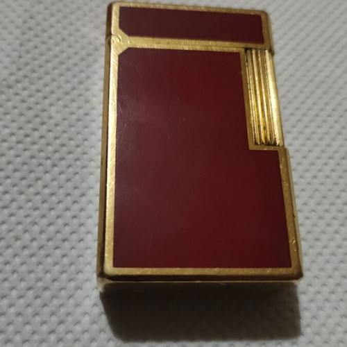S.T.Dupont lighter like new, gold and red, refillable gas
