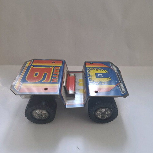 Retro tin buggy toy used with missing parts