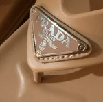 Prada women's nude flip flops size 37/38