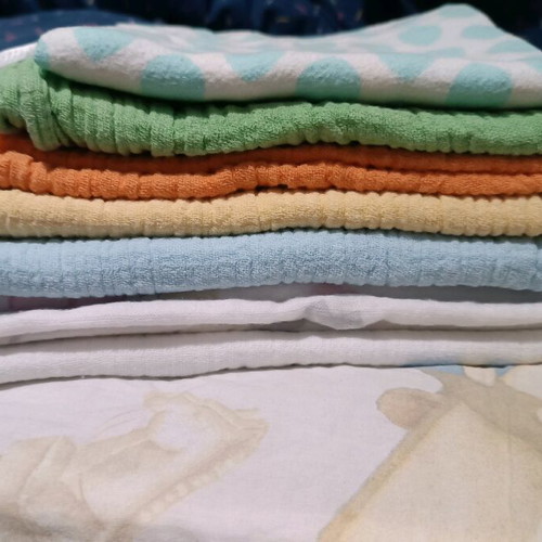 Baby muslin cloths like new, pack of 8 with changing mat cover