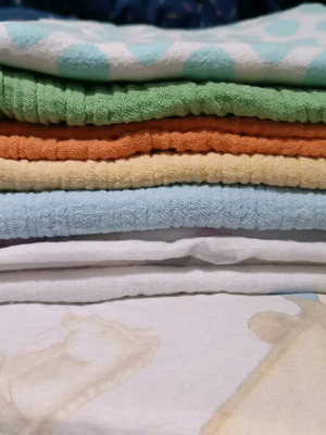Baby muslin cloths like new, pack of 8 with changing mat cover