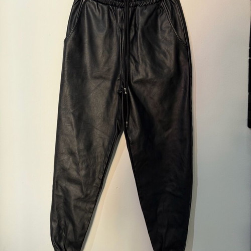 Women's black leather balloon or jogger pants used, with elastic waist and cuffs