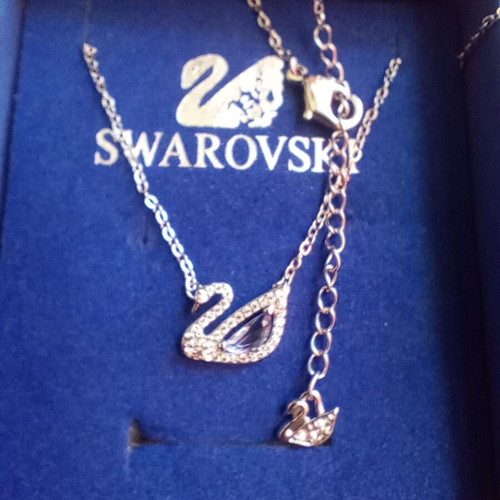 Swarovski necklace original, like new, silver color