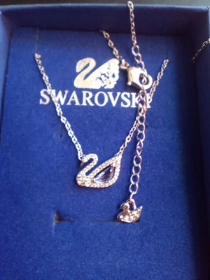Swarovski necklace original, like new, silver color