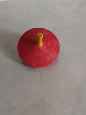 Wooden spinning top used