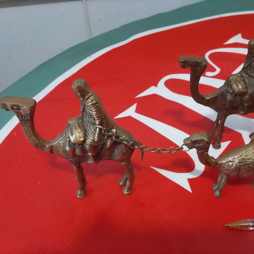 Antique brass paperweight caravan with camels and Bedouins like new