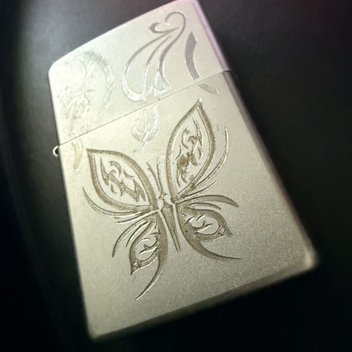 Zippo lighter used with laser engraved design