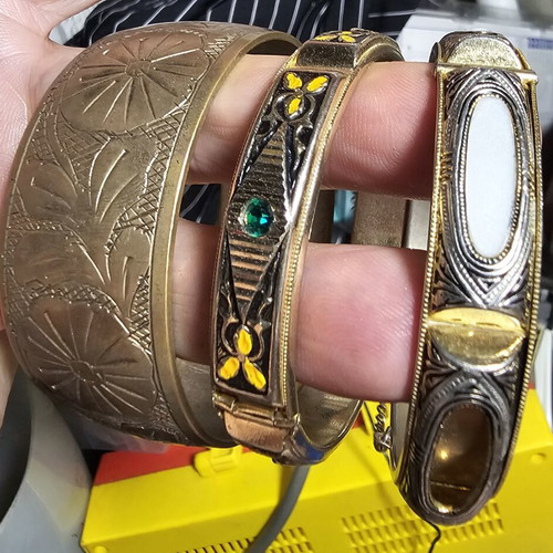 Vintage women's bracelet set used, one missing a stone