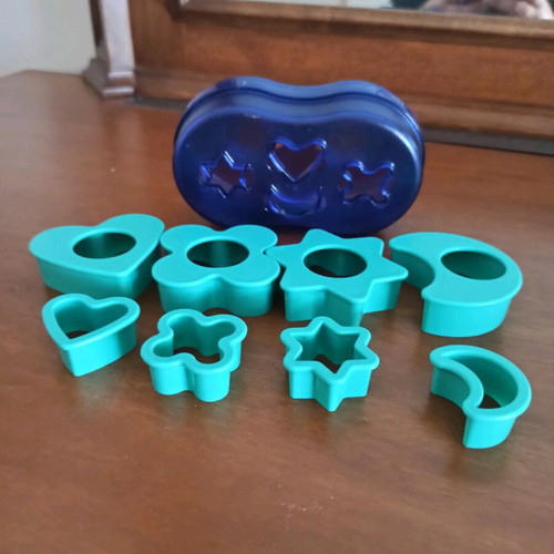 Tupperware Cookie Cutters Set like new with various shapes