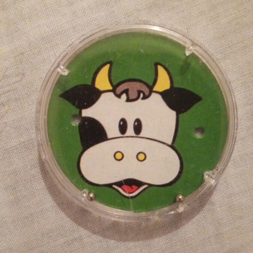Mini skill game with cow design used