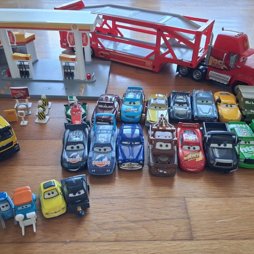 Mcqueen Disney/Pixar Cars toy set used with Mack truck and Shell gas station