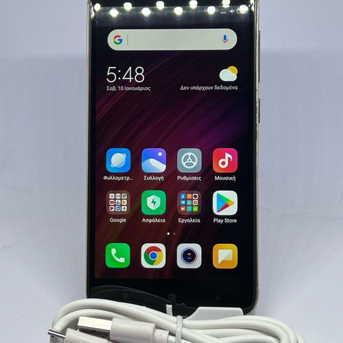 Redmi 4X smartphone μεταχειρισμένο, γκρι, Android με καλώδιο φόρτισης