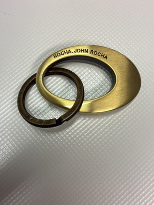 John Rocha brass keychain