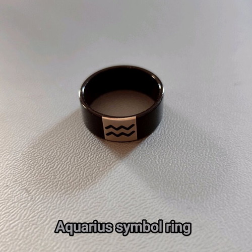 Aquarius ring like new, black, 1.8 cm wide