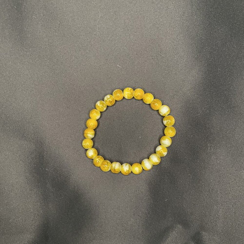 Boho handmade bracelet with yellow crackle beads