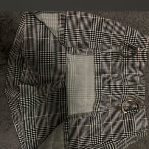 Skort used black and white plaid with silver buckles and pink detail