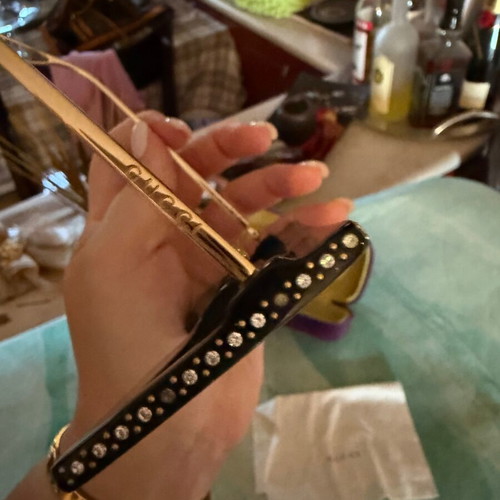 Gucci sunglasses used, black with missing rhinestones