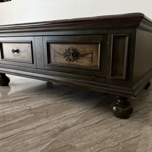 Coffee table used with storage space