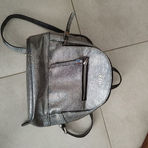 Kem backpack silver like new, metallic