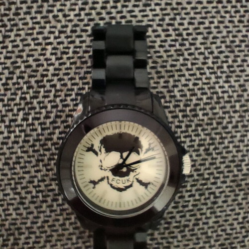 FCUK wristwatch new with changing display