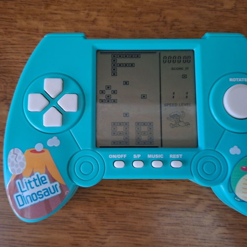 Little Dinosaur Brick Game retro handheld console used, low sound