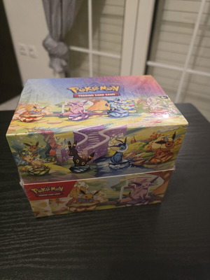 Prismatic Evolutions sealed Pokemon TCG tin