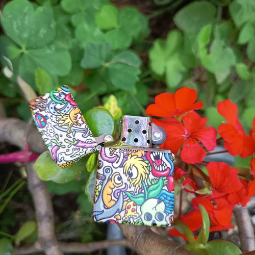 Zippo Crazy Collage Design lighter used with colorful 540 Color print