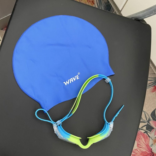 Swim cap and goggles used