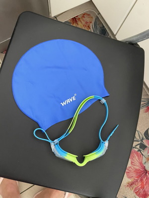 Swim cap and goggles used