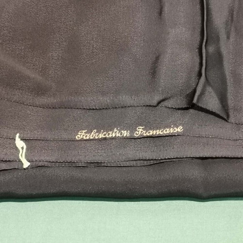 Black satin fabric used for women's dresses