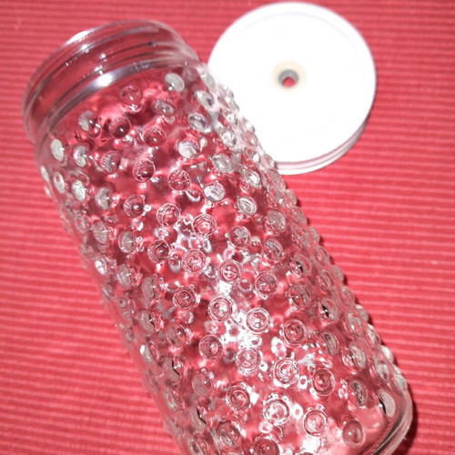 Large drink glass with hole for straw
