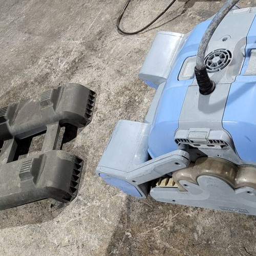 Automatic robotic pool cleaner used with transport and storage base