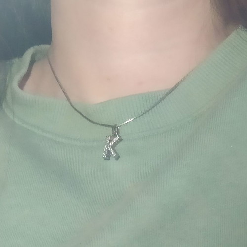 Necklace used with letter K in silver color