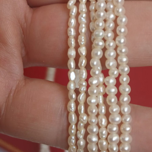 Two freshwater pearl necklaces with gold and metal clasps