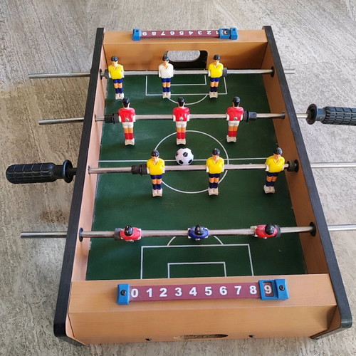 Wooden foosball table used with 1 ball, missing two plastic handles