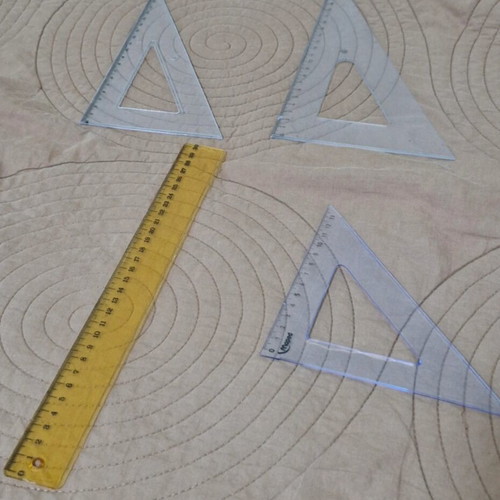 Set of four rulers in various sizes