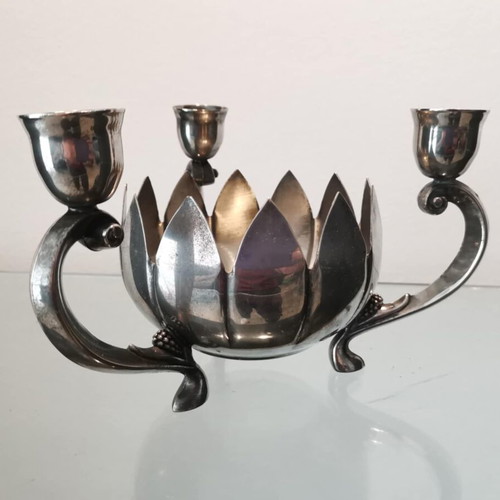 Vintage three-arm candlestick used, silver-plated metal