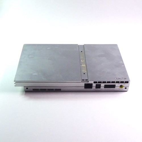 PlayStation 2 PS2 Slim silver console used for repair