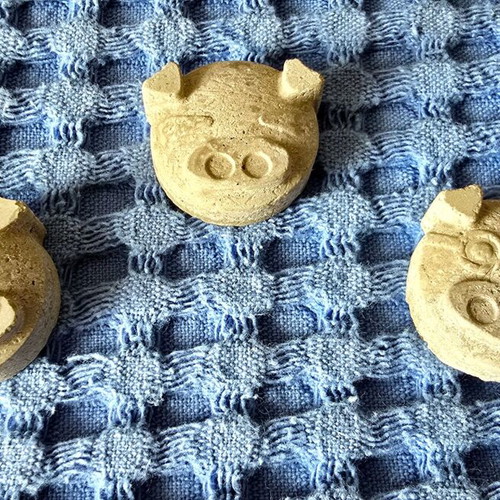 11 handmade concrete pig figurines with heart
