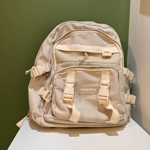 Beige travel bag backpack, used