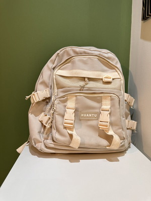 Beige travel bag backpack, used