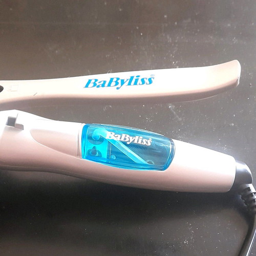 Babyliss hair straightener with three plates used and steam