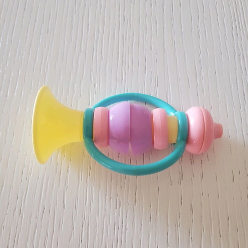 Baby toys ball and horn like new in pastel colors